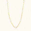 stainless steel necklace with paper clip shape on light beige background by verosteel jewelry