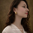useer iamiroda on instagram wearing verosteel teardrop earrings