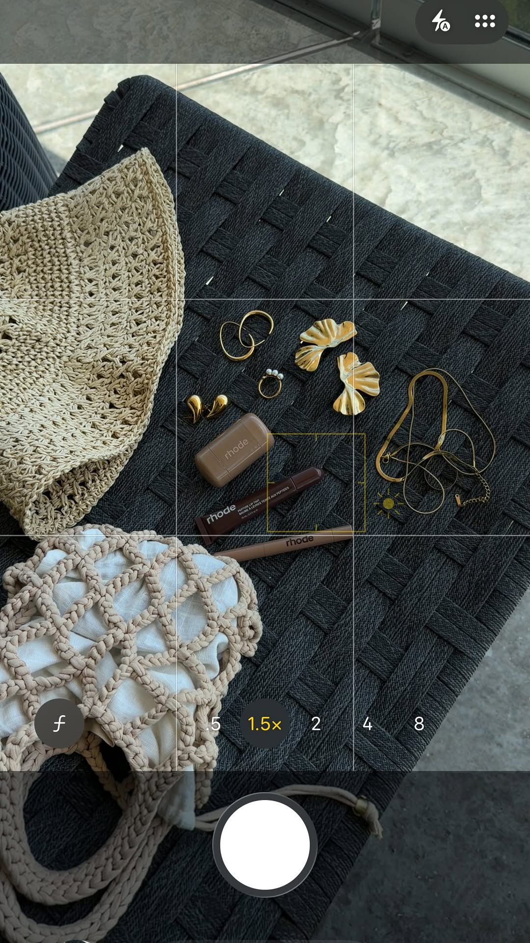 Minimal style of customer layering the jewelry with different accessories