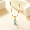 blue waterdrop necklace with aesthetic setting 