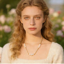 close up picture of model showcasing a gold-plated necklace made by waterproof stainless steel 