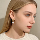 Boucles d'oreilles pendantes coquillage et perle