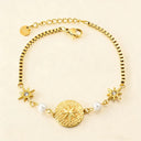 close up look of north star & pearl charm chain bracelet